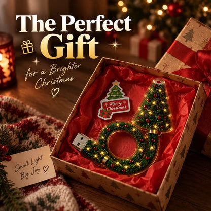 USB Christmas tree projector displayed beside a gift box